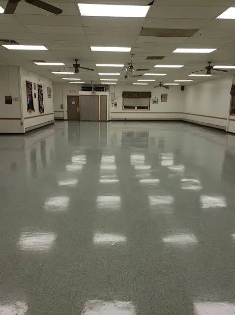 Community hall VCT floor after strip and wax